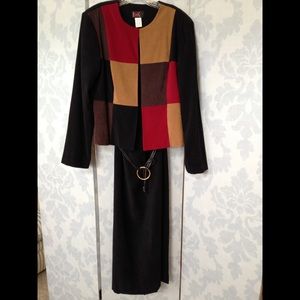 Black sleeveless dress with jacket.